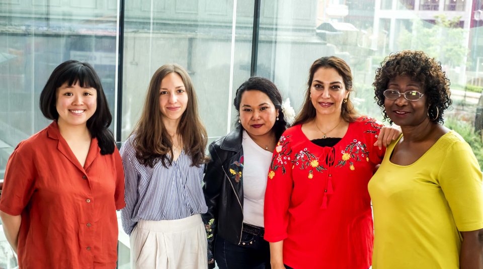 Five members of the People's History Museum community team standing looking at the camera.